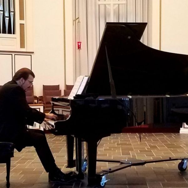 Tom-playing-piano-cropped-1024x682-1